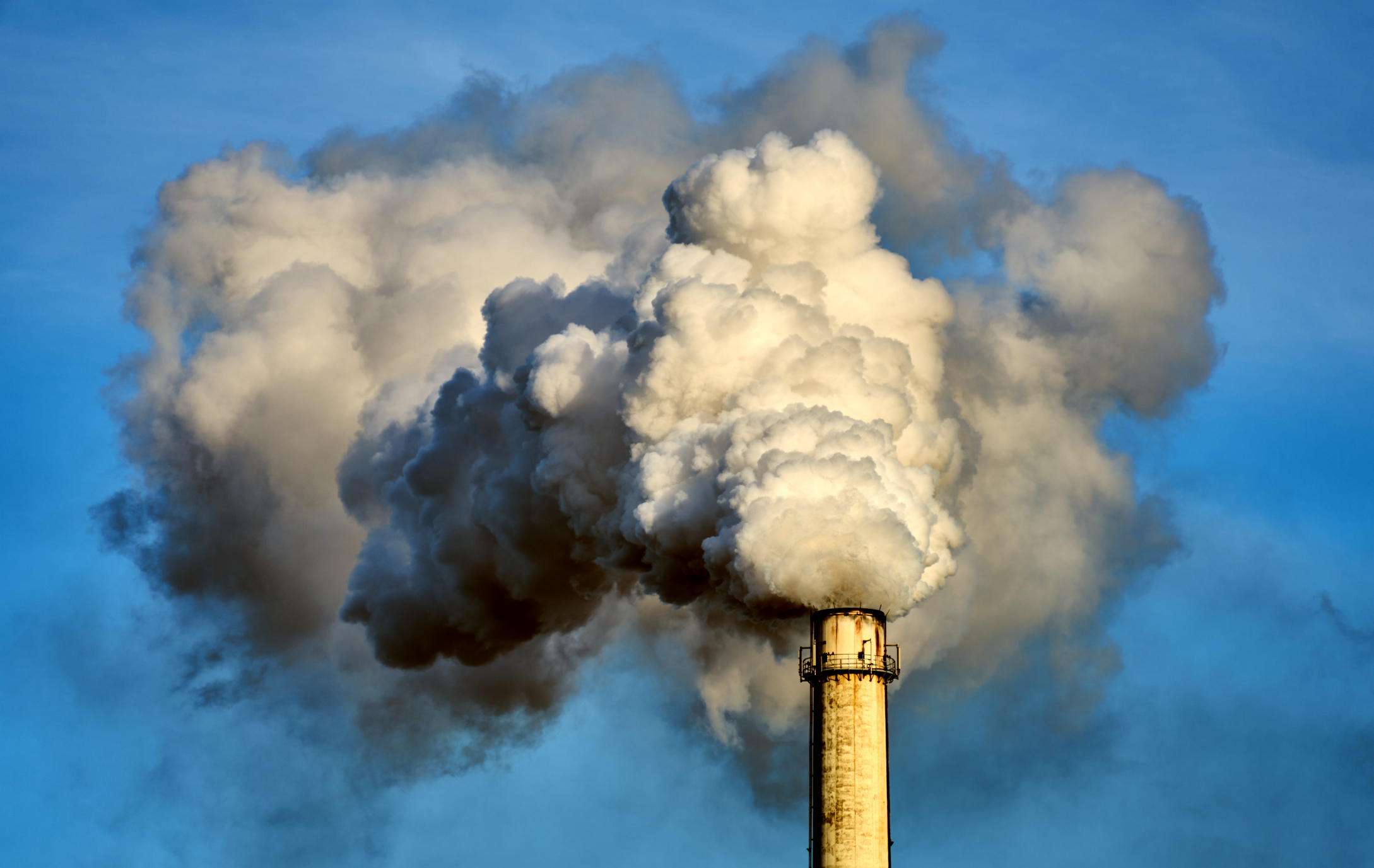 An industrial chimney with heavy emissions